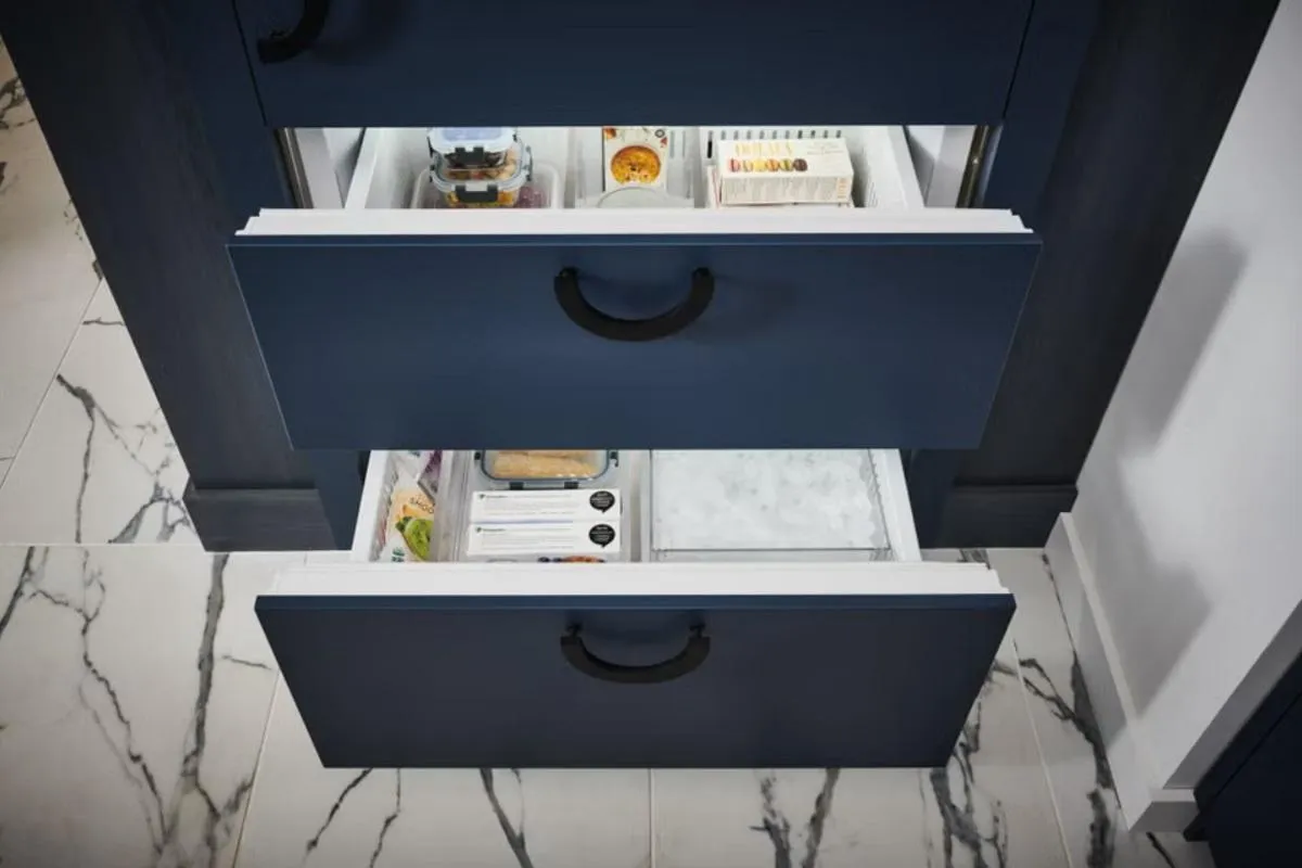 Open refrigerator storage drawers