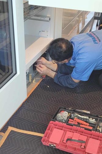 Appliance Technician fixing Vancouver Appliances